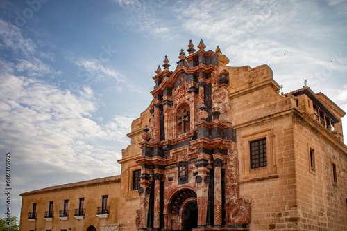 Facade of the Basilica de la Vera Cruz in Caravaca, Murcia, Spain, with red and black marble decorations, Baroque style photo