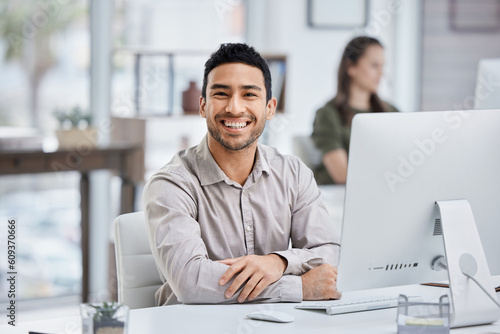 Businessman, smile and portrait with a computer at desk for research, planning and internet connection. Happy asian male entrepreneur with a desktop pc in a modern office for a corporate project