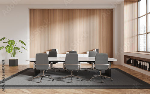 Beige and wooden meeting room interior