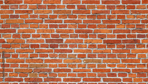 An old damaged orange brick wall as an architectural background