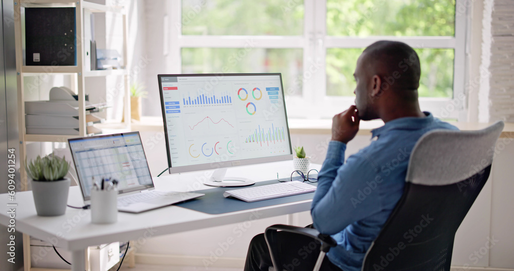 African Businessman Using Analytics Data KPI Dashboard African Businessman Using Analytics Data KPI Dashboard