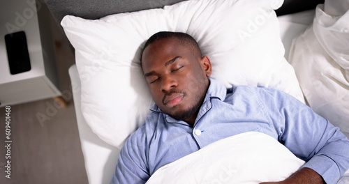 Young Happy Smiling African Man Waking Up