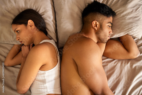 Bild auf Leinwand Sad woman, couple fight and man angry from affair, relationship problem and depressed in bed