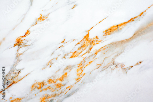 Texture White milky marble with bright orange veins and splashes