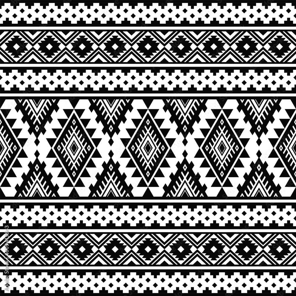 Geometric seamless tribal pattern with ethnic Aztec motives in black and white. Abstract background in ethnic style. Design for textile, fabric, clothes, curtain, carpet, batik, ornament, wallpaper. Geometric seamless tribal pattern with ethnic Aztec motives in black and white. Abstract background in ethnic style. Design for textile, fabric, clothes, curtain, carpet, batik, ornament, wallpaper.