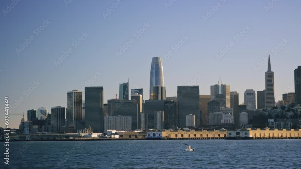 Pan across San Francisco skyline fom the Bay at sunset on clear afternoon Pan across San Francisco skyline fom the Bay at sunset on clear afternoon
