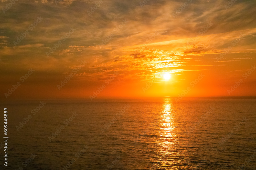 Gorgeous panorama scenic strong sunrise cloud on orange sky.