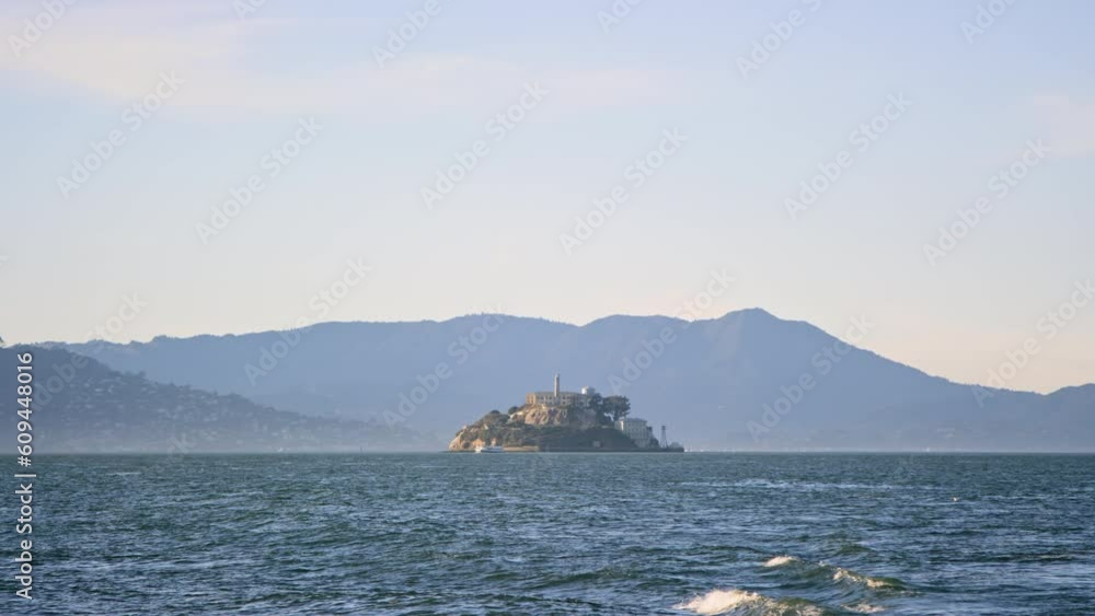 Alcatraz Island in the distance in San Francisco Bay from south side, telephoto Alcatraz Island in the distance in San Francisco Bay from south side, telephoto