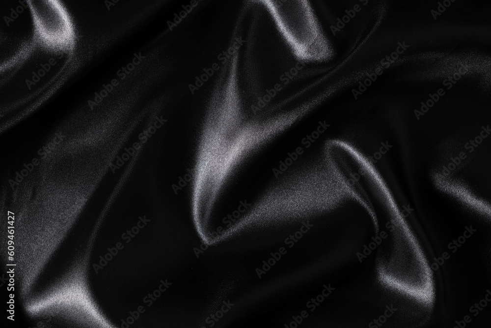 Silk fabric, abstract wavy black satin fabric background. Silk fabric, abstract wavy black satin fabric background.