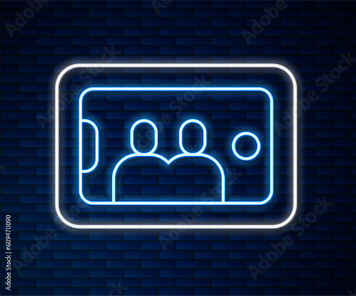 Glowing neon line Selfie on mobile phone icon isolated on brick wall background. Romantic self portrait, young friends taking selfie photo at smartphone. Vector