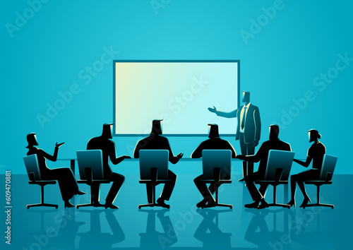 Business person giving a presentation in front of a board of directors