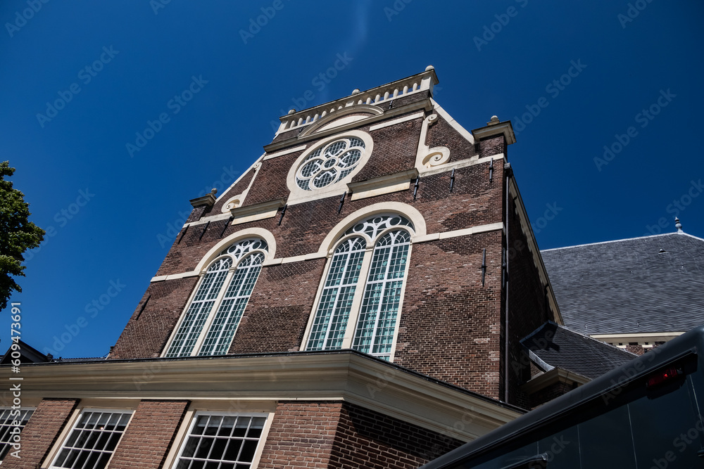 Northern church (Noorderkerk, 1620 - 1623) - 17th-century Protestant church in Jordaan neighborhood along Prinsengracht canal. Amsterdam, the Netherlands. Northern church (Noorderkerk, 1620 - 1623) - 17th-century Protestant church in Jordaan neighborhood along Prinsengracht canal. Amsterdam, the Netherlands.