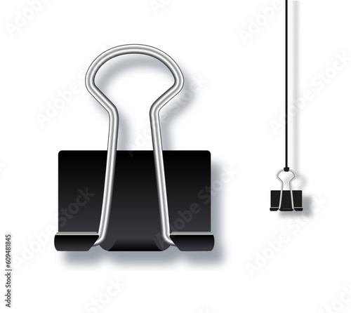 Metal paper clip or binder. Office stationary tool on isolated background. Realistic style illustration. Vector illustration