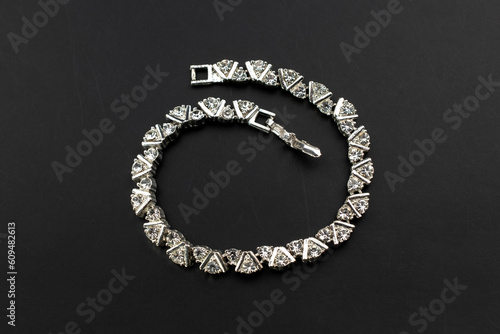 Dainty clear crystal bracelet, unique vintage jewelry background, rhinestone jewelry concept, promotional photo for an online jewellery store