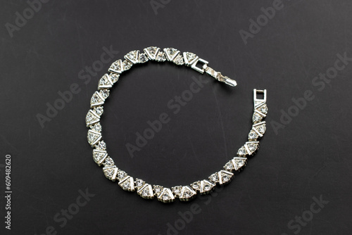 Dainty clear crystal bracelet, unique vintage jewelry background, rhinestone jewelry concept, promotional photo for an online jewellery store