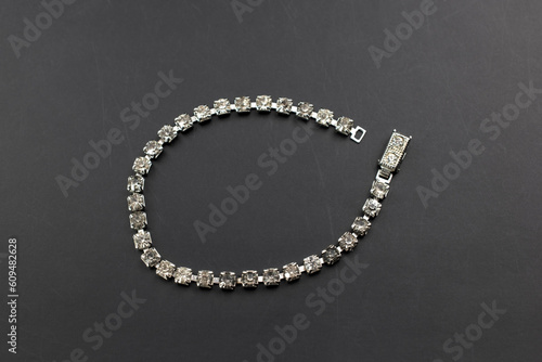 Dainty clear crystal bracelet, unique vintage jewelry background, rhinestone jewelry concept, promotional photo for an online jewellery store