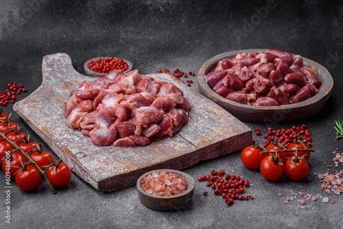 Raw chicken or turkey gizzards with salt, spices and herbs