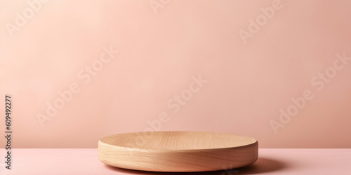Round wooden saw cut cylinder shape on pink background abstract background. Minimal box and geometric podium