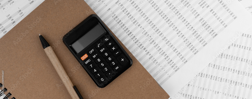 Calculator on financial statement. Financial concept. Calculator on financial statement. Financial concept.