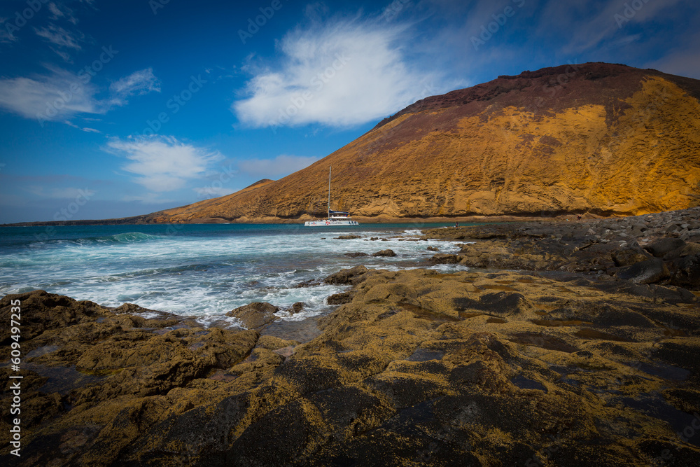 Beach and Landscape town views, from La Graciosa off the coast of Lanzarote in the canary islands spain Beach and Landscape town views, from La Graciosa off the coast of Lanzarote in the canary islands spain