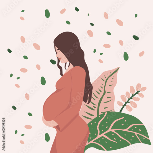 beautiful pregnant woman with a flowers and leafs on background