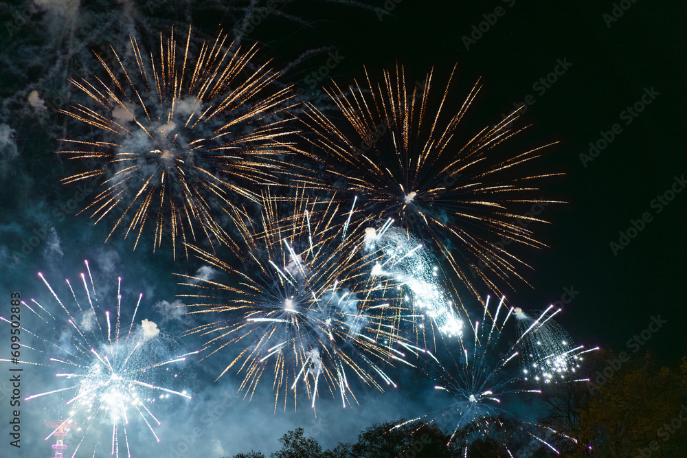 White and yellow and green fireworks celebration