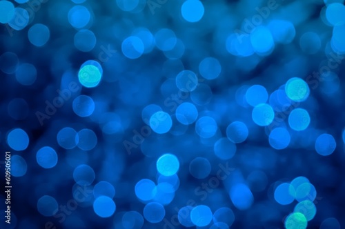 Obraz na płótnie Blue abstract background. Blurred and glowing blue lights. w salonie