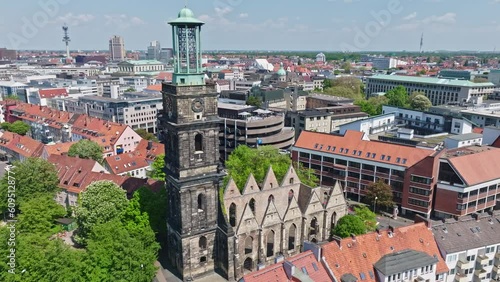 Drone shot of Ruine der Aegidienkirche . Aegidien Church, after Saint Giles to whom the church was dedicated, is a war memorial in Hanover, the capital of Lower Saxony, Germany. photo