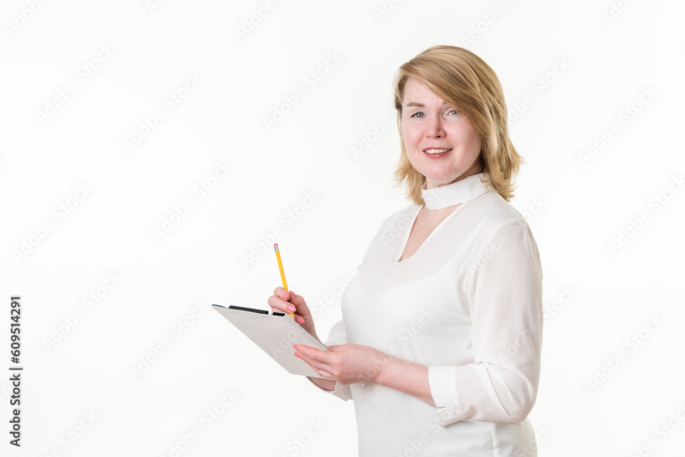 Portrait businesswoman looking camera, writes on clipboard with pencil. Concept white collar worker Portrait businesswoman looking camera, writes on clipboard with pencil. Concept white collar worker