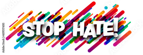 Stop hate sign over colorful brush strokes background.