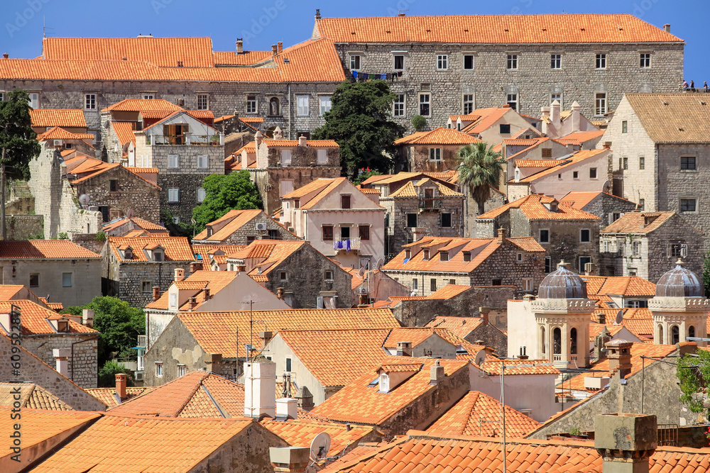 Dubrovnik Croatia skyline and roofs looking out to the Adriatic Sea in the bright Mediterranean summer Dubrovnik Croatia skyline and roofs looking out to the Adriatic Sea in the bright Mediterranean summer