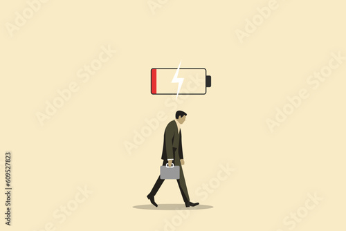 Businessman with low battery red color. Business life energy