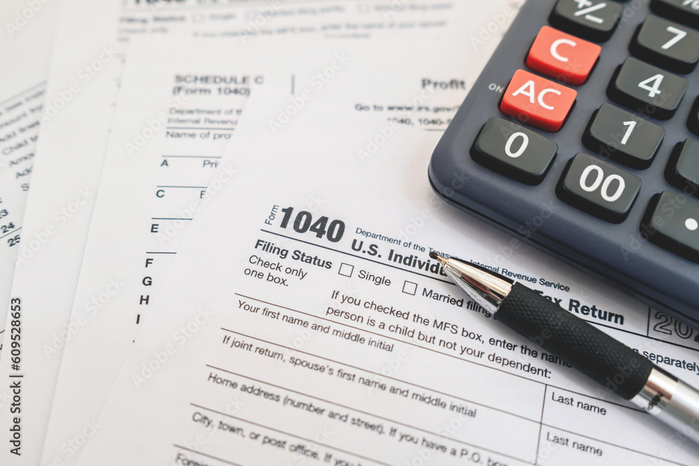 United States Tax forms background for individual tax return. Business and Tax concept. United States Tax forms background for individual tax return. Business and Tax concept.