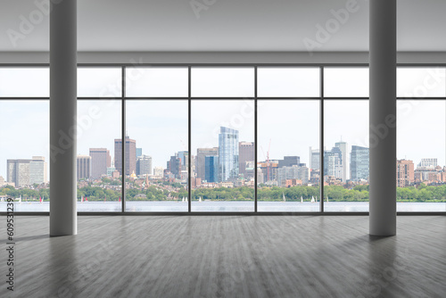 Panoramic picturesque city view of Boston at day time from modern empty room, Massachusetts. An intellectual, technological and political center. 3d rendering.