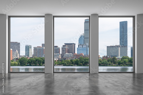 Panoramic picturesque city view of Boston at day time from modern empty room, Massachusetts. An intellectual, technological and political center. 3d rendering.