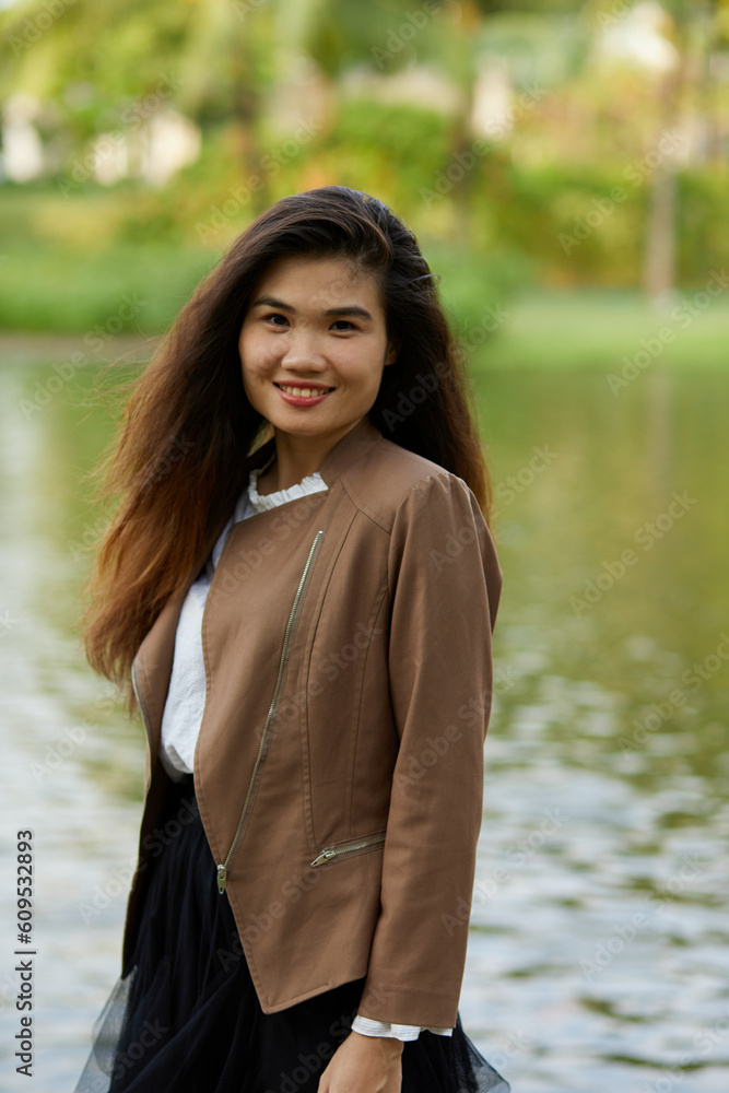 Vietnamese woman in the park during lunchtime in Vietnam. Vietnamese woman in the park during lunchtime in Vietnam.