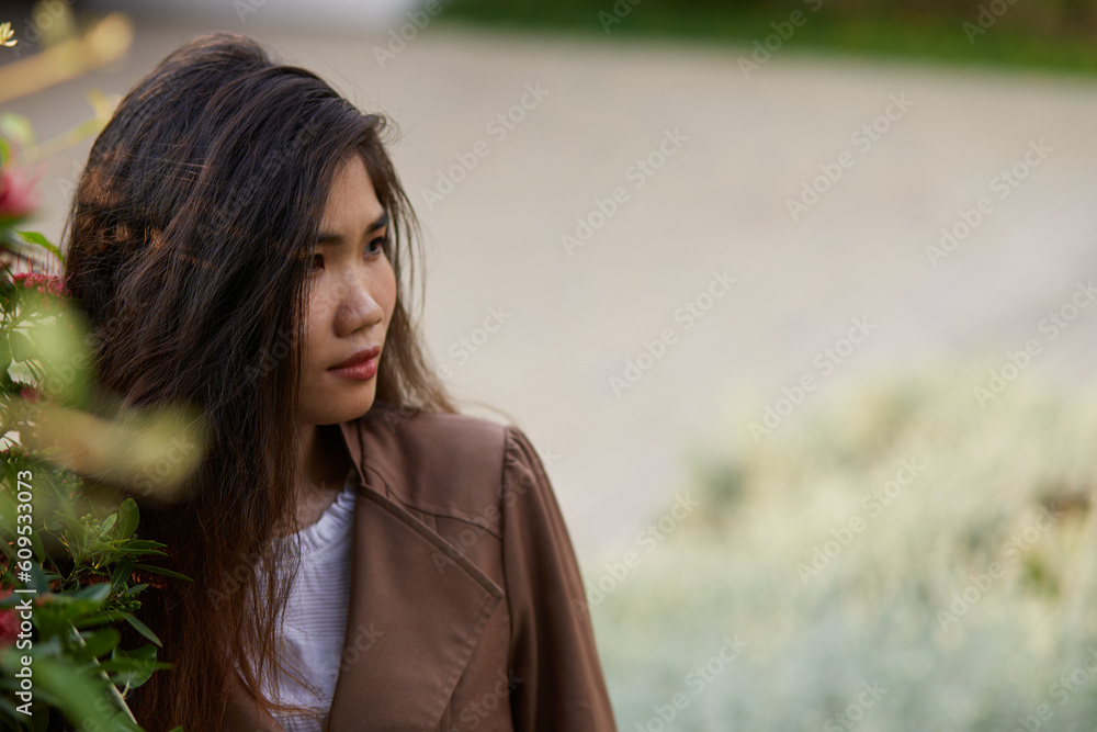 Vietnamese woman in the park during lunchtime in Vietnam. Vietnamese woman in the park during lunchtime in Vietnam.