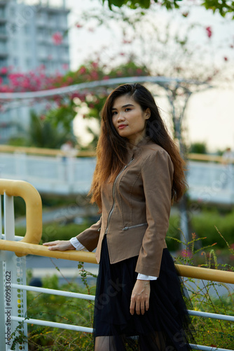 Vietnamese woman in the park during lunchtime in Vietnam.