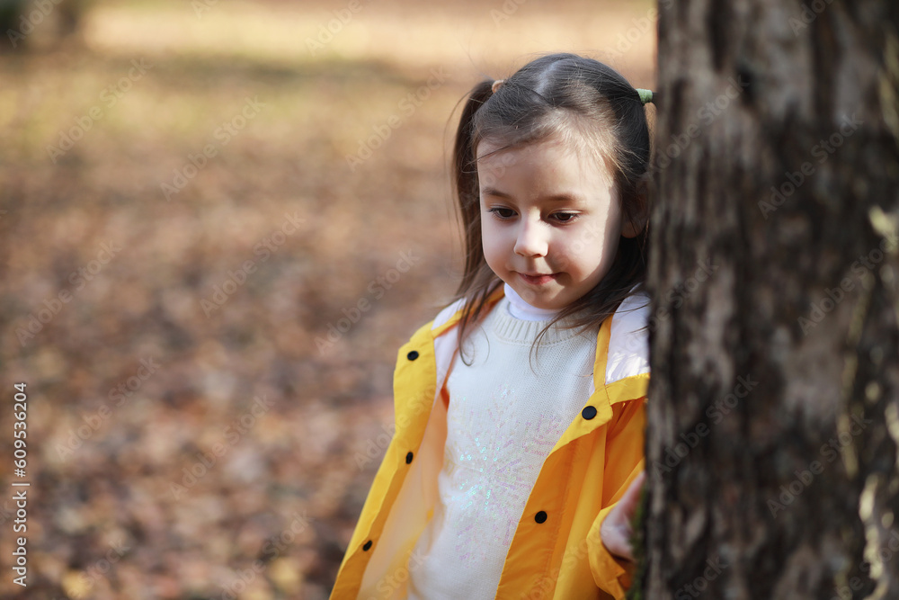 Children walk in the autumn park Children walk in the autumn park