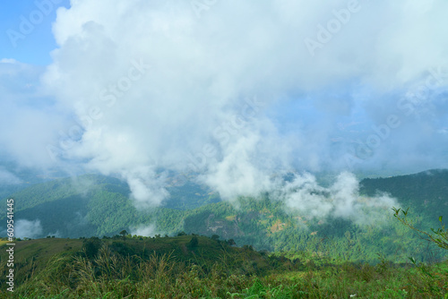 Beautiful landscape of mountain in the morning and winter fog at Doi Moncham, Chiang Mai, Thailand 