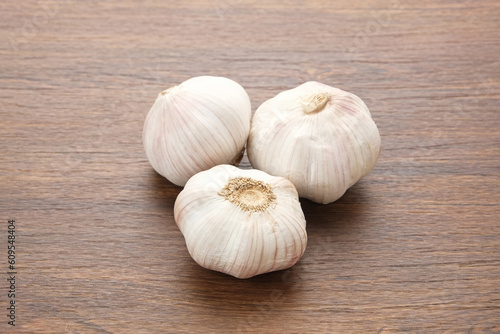 Fresh garlic  bawang putih  on a wooden table 