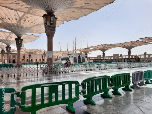 A beautiful daytime view of Masjid Al Nabawi  Medina s outer courtyard and electric canopies. 