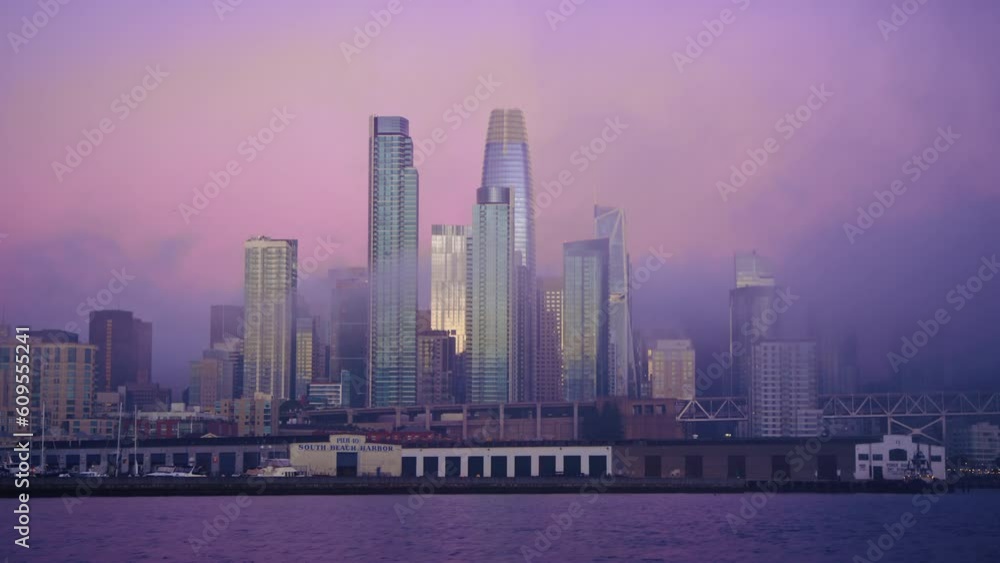 Downtown San Francisco cityscape at dawn from boat in San Francisco Bay