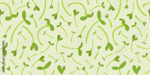 Fresh microgreens pattern on a green background