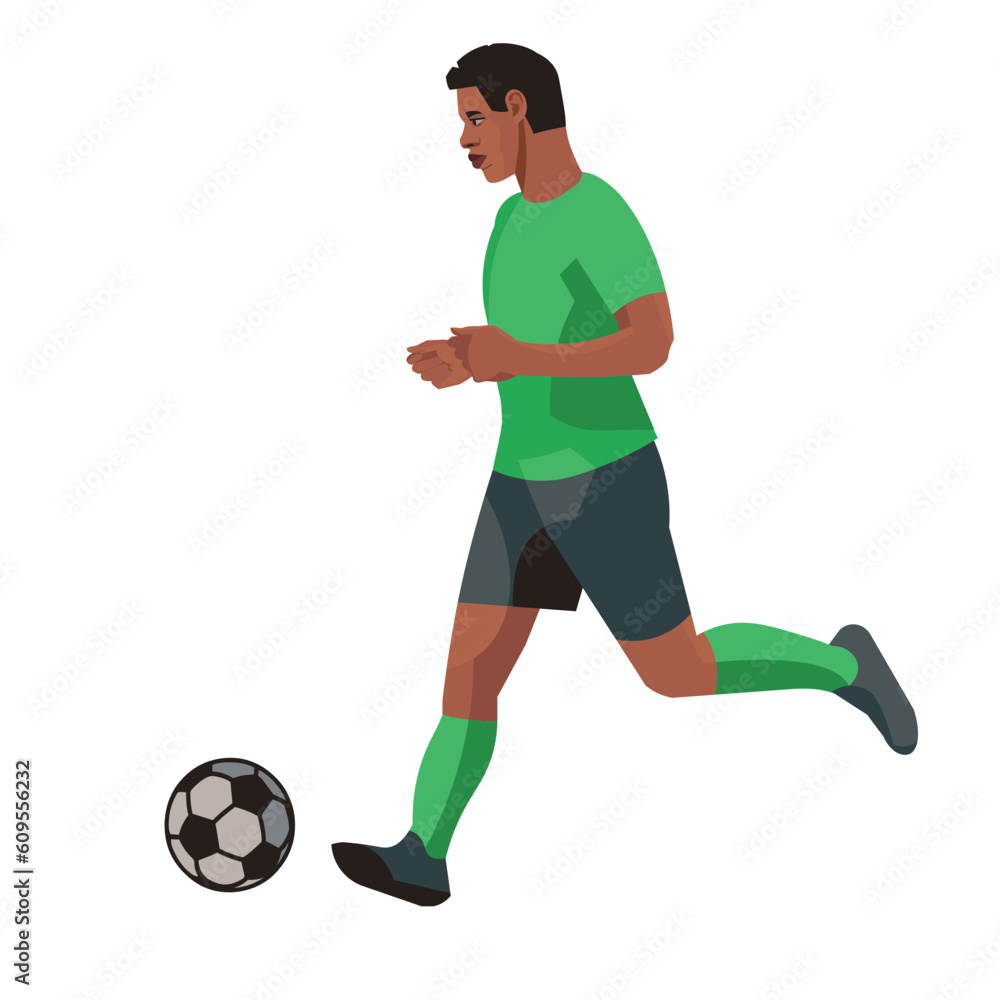 African football player in green sports equipment in profile runs after the ball African football player in green sports equipment in profile runs after the ball