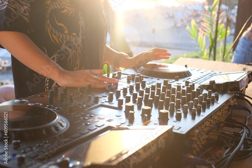 Fototapeta Naklejka Na Ścianę i Meble -  DJ performing during sunset in Canggu, Bali