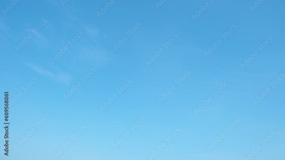 Blue sky cloud time-lapse is a video sequence that captures the movement of clouds in a clear blue sky over time. It showcases the beauty and dynamic nature of the sky. Timelapse. Nature background
Blue sky cloud time-lapse is a video sequence that captures the movement of clouds in a clear blue sky over time. It showcases the beauty and dynamic nature of the sky. Timelapse. Nature background