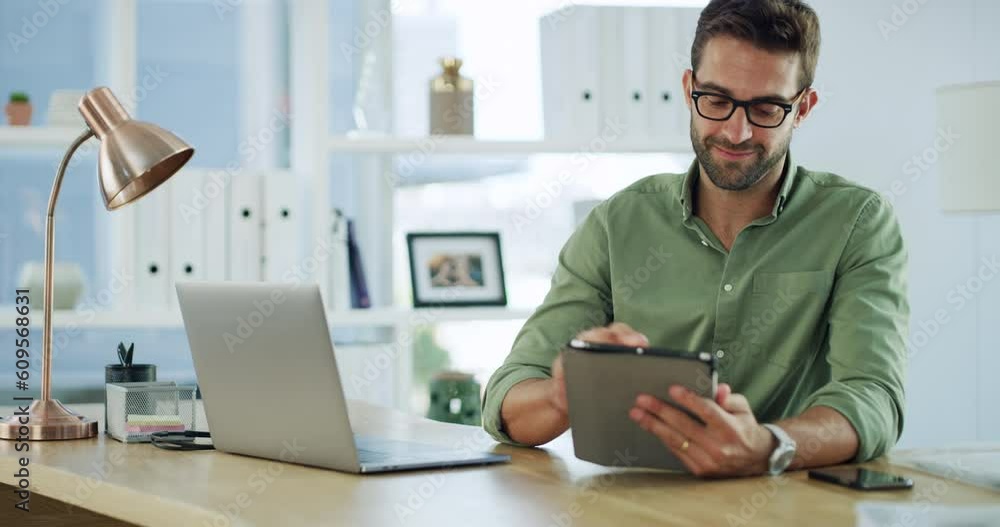 Tablet, laptop and office with a business man doing web analyst work for website. Working, typing and online employee planning a iot project for ux in a startup company with smile for remote work