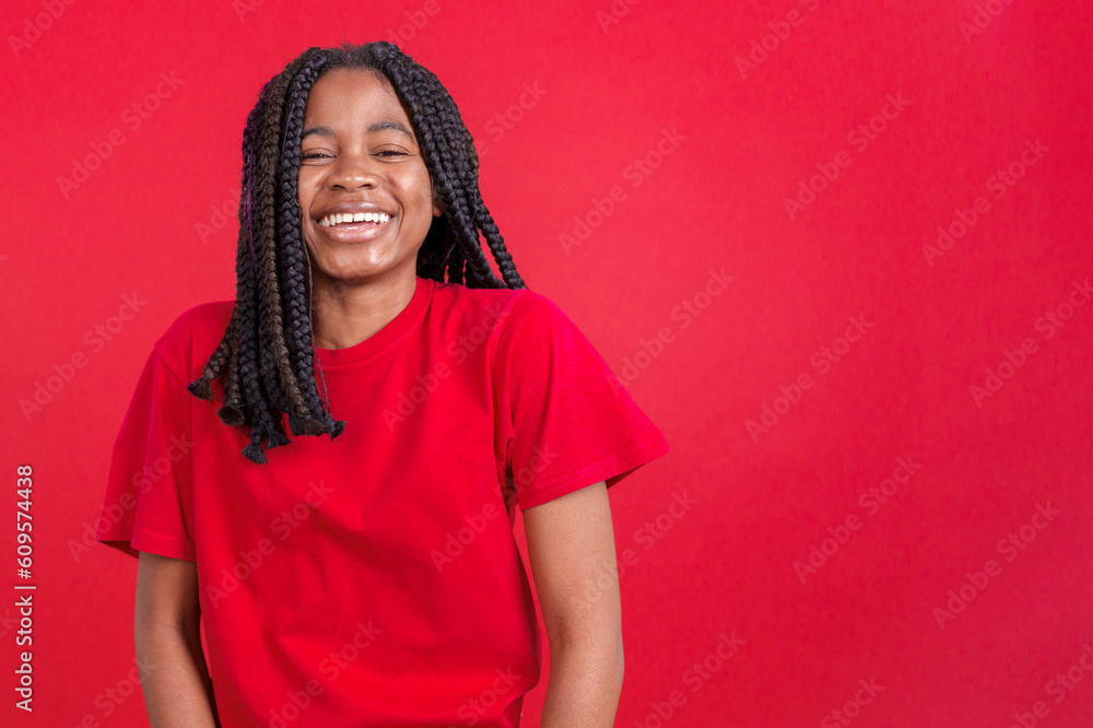 Happy african woman smiling at the camera Happy african woman smiling at the camera