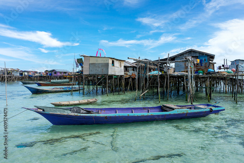 Small boats moored at the edge of a nomadic Bajau Laut village on the edge of an island in Semporna  Malaysia waters